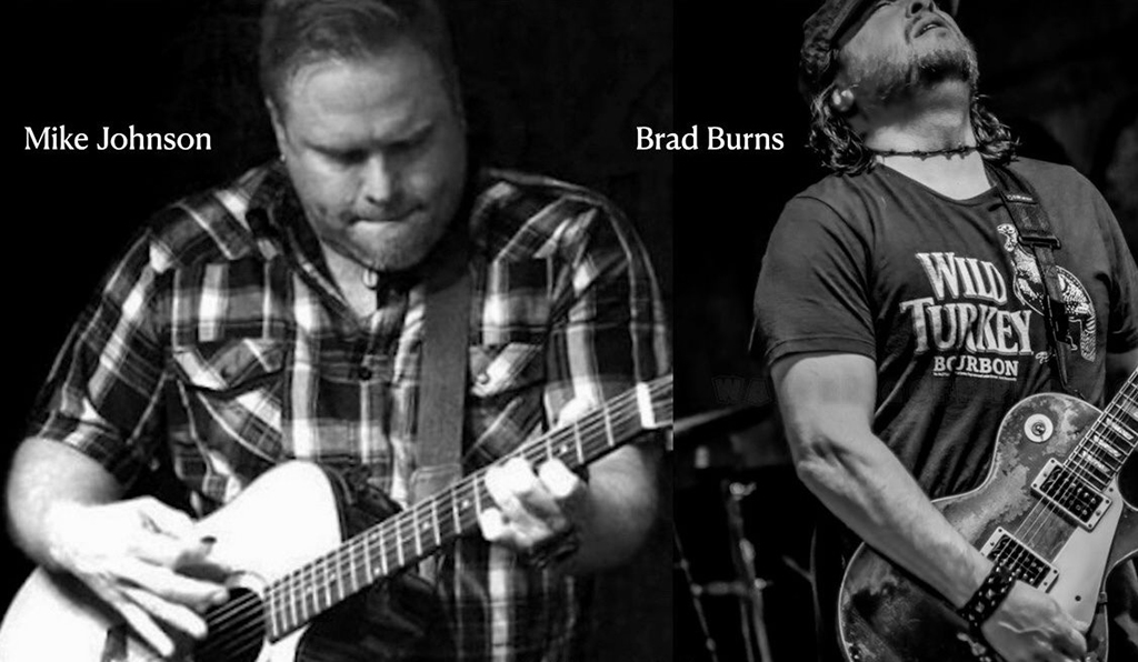 Musicians Mike Johnson and Brad Burns on guitars