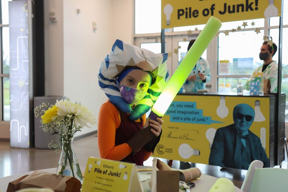 child in costume at the cade museum