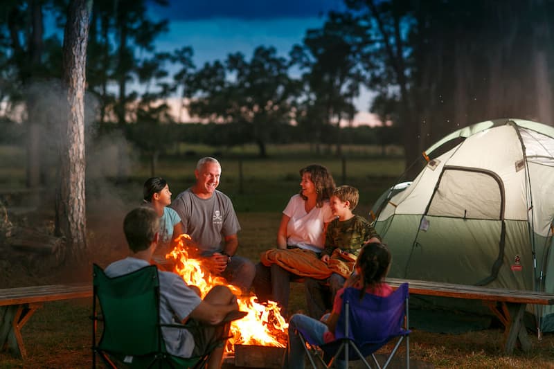 Multi generational family at the camp fire