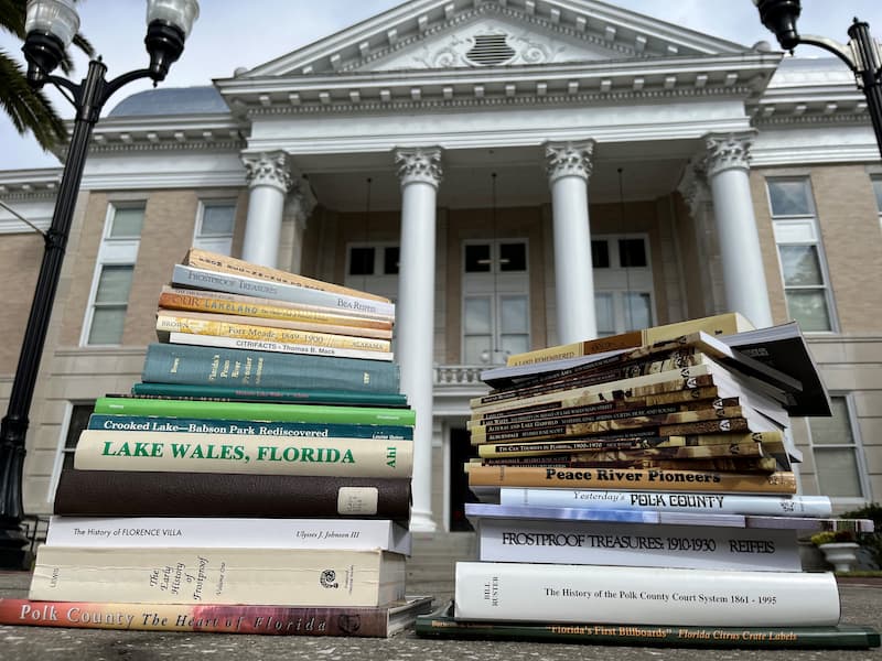 Books stacked outside Polk History Center