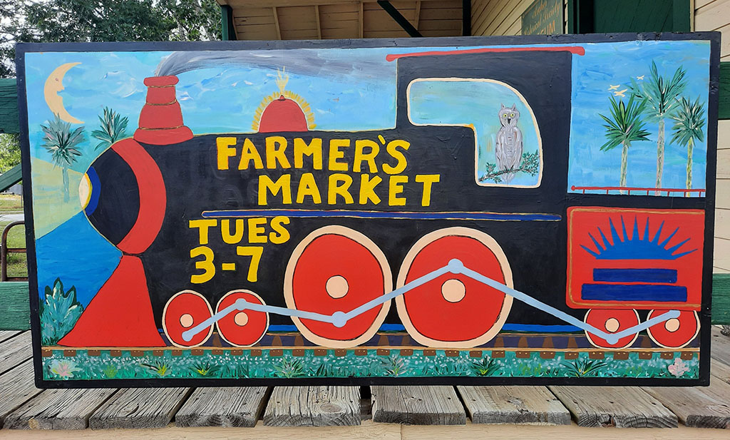 sign at archer farmers market