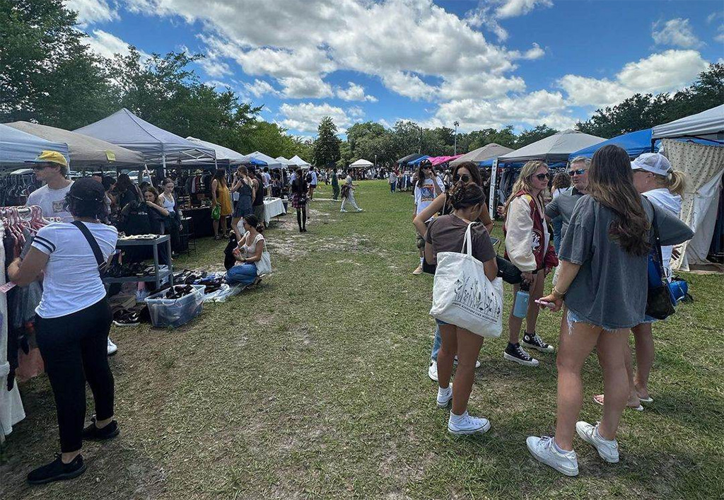 people shopping at oudoor market