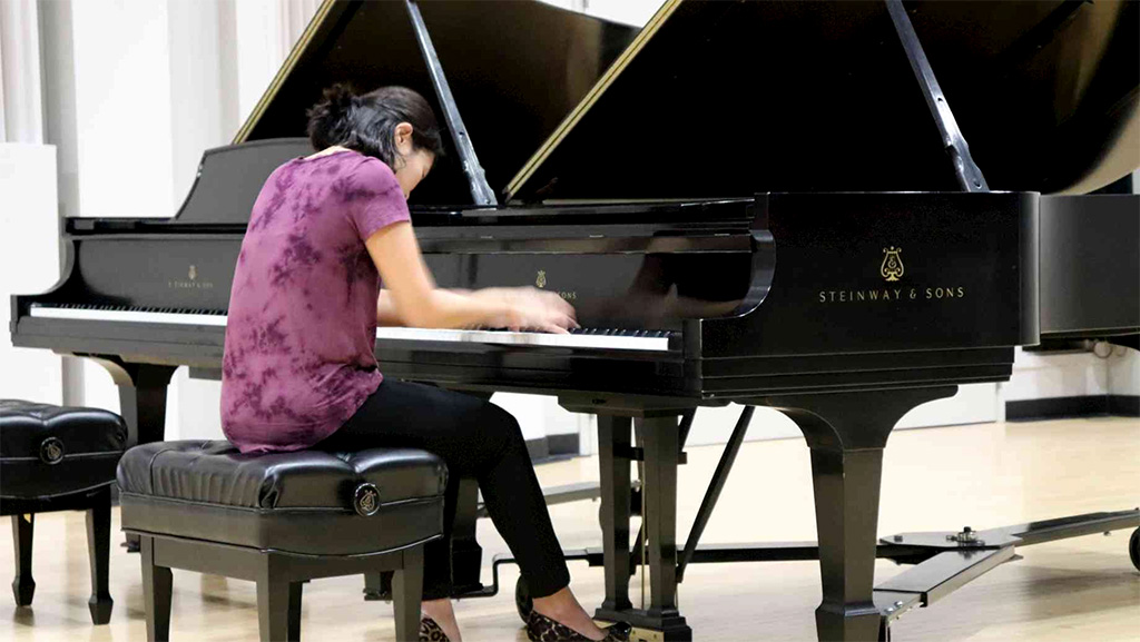 person playing piano