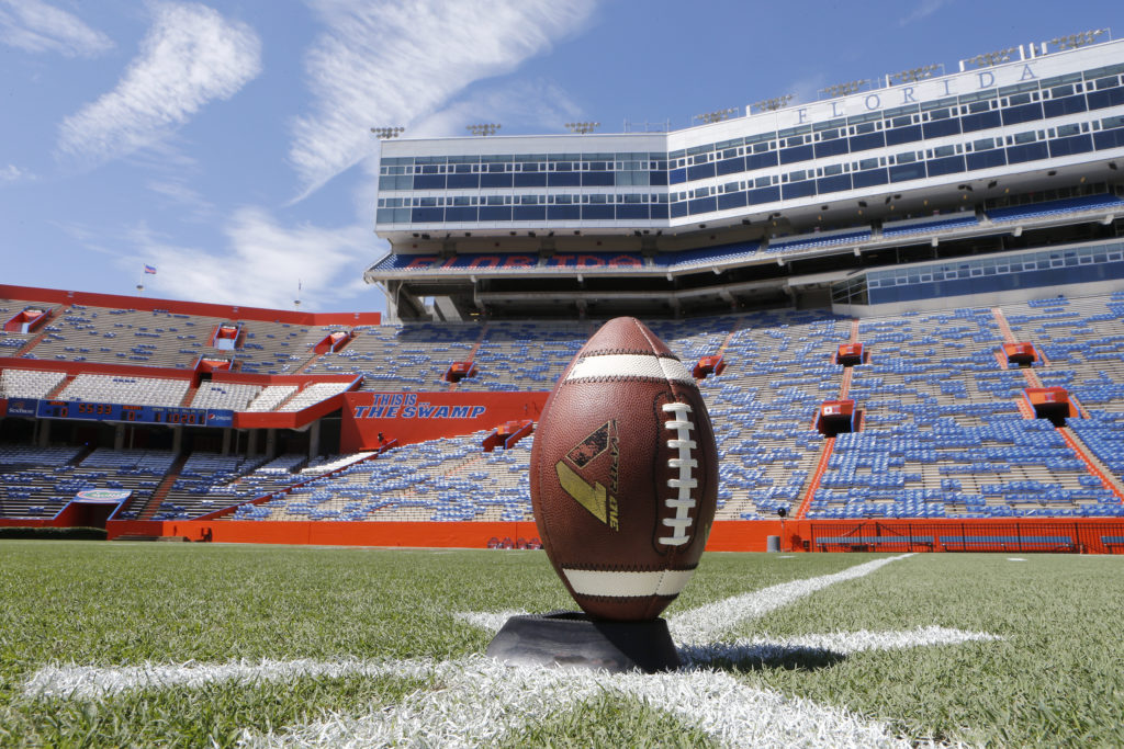 Football on kicking tee at The Swamp at The University of Florida