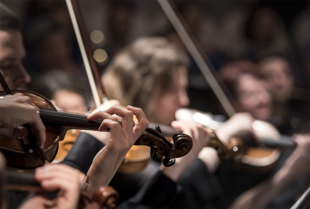 musicians playing violins